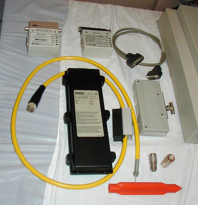 Early 10BASE5 ThickNet Ethernet transceivers and a vampire tap