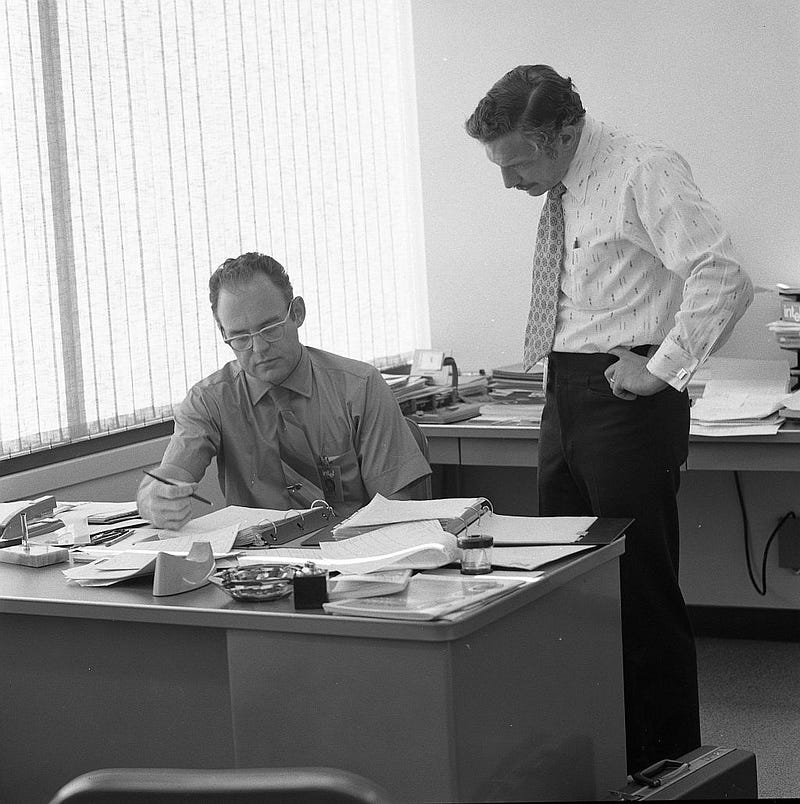 Intel co-founders Gordon Moore (left) and Robert Noyce (right) in 1970. Noyce co-founded Fairchild Semiconductor before starting Intel with Moore. Intel Free Press, CC BY-SA 2.0, via Wikimedia Commons.