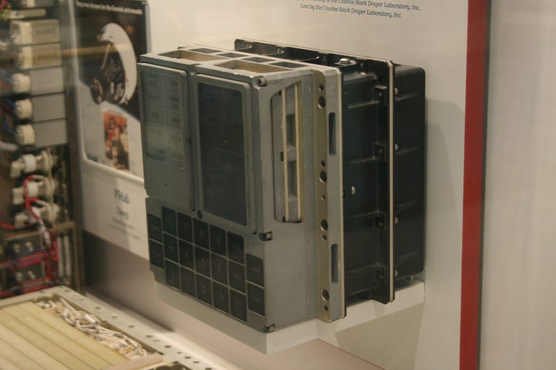 The Apollo Guidance Computer, a compact metal box roughly one cubic foot in size